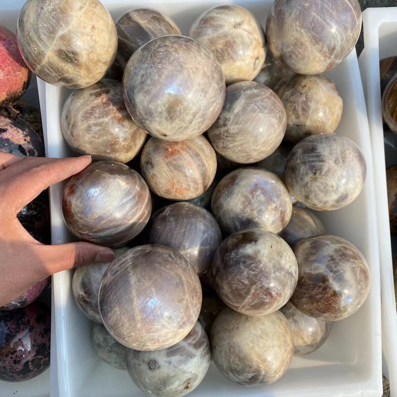 Moonstone and sunstone sphere, price by kg
