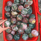 Pink ocean jasper sphere, price by kg