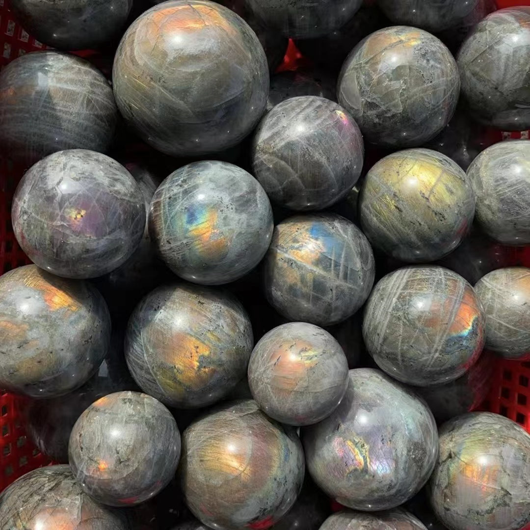 Purple and red labradorite sphere, price by kg