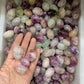 Purple and red fluorite tumbles, price by kg